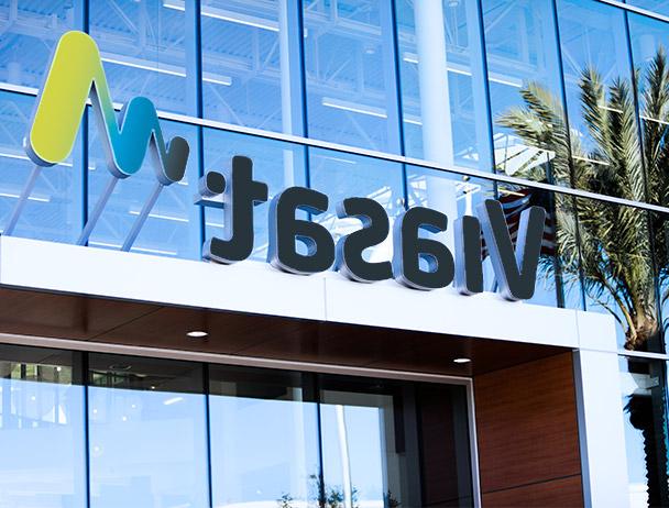 Viasat logo on top of corporate building entrance